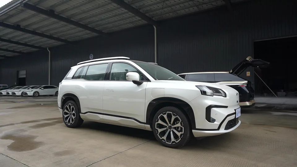 A white electric vehicle in natural daylight