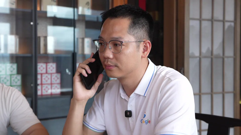 A team member speaking on the phone