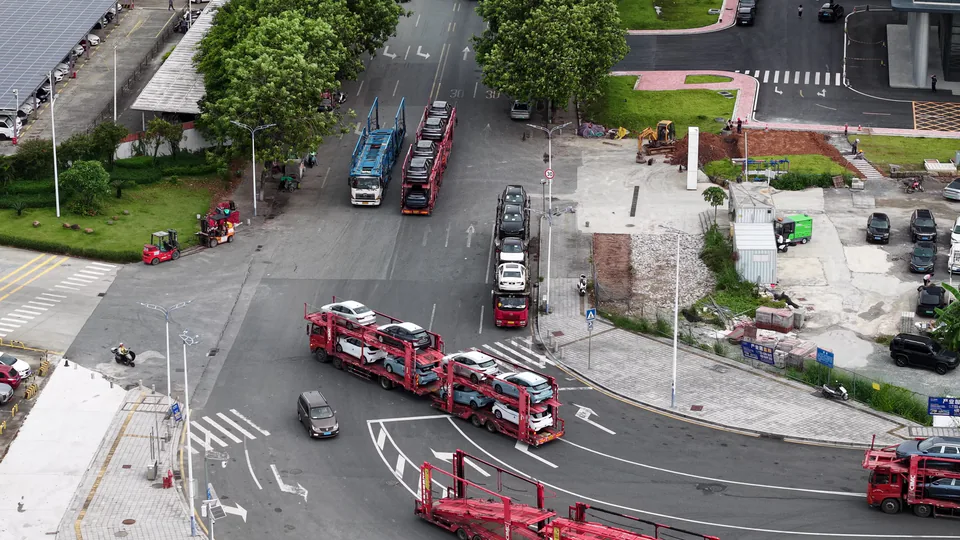 Aerial view of vehicle transporters at a road junction